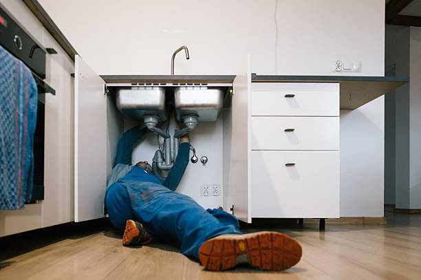 Professional Drain Cleaning technician working in Little Falls, NJ